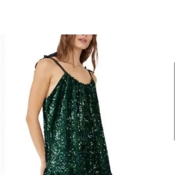 Free People Nova Convertible Sequin Mini
Size L,XS green
NWOT - Picture 5 of 11